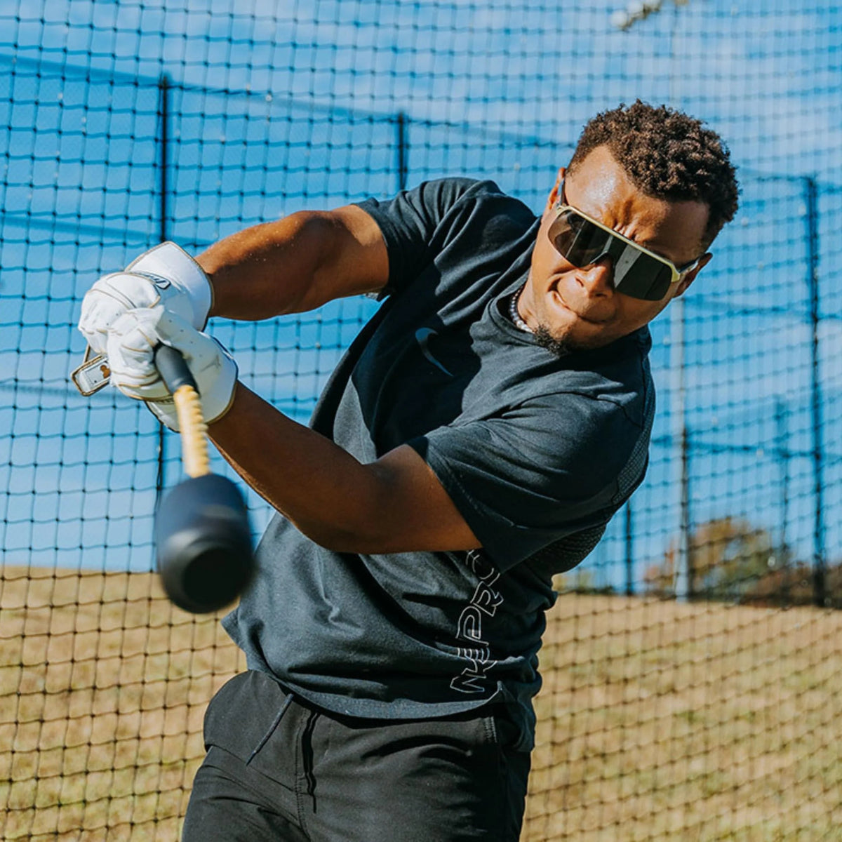 Baseball And Softball Swing Trainer With 12 Soft Balls, 12-Inch Grip, Fits 26 in To 34 in Bats